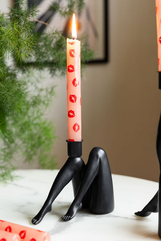 Lifestyle image of the Sexy Legs Candle Holder In Black