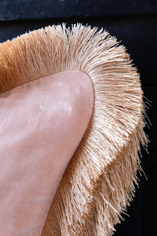 Close-up image of the Gold Velvet Fringed Show Must Go On Embroidered Cushion