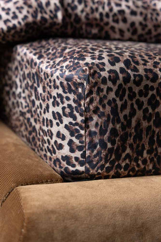 Close-up of the corner of the Signature Leopard Print Cotton Sateen Fitted Sheet.
