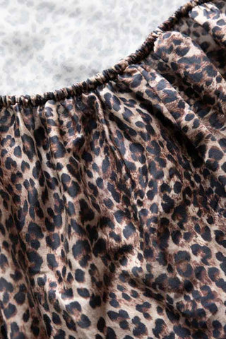 Close-up of the beneath of the Signature Leopard Print Cotton Sateen Fitted Sheet.