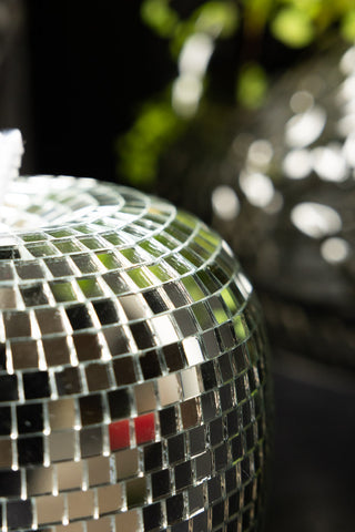 The side of the Silver Disco Ball Apple Decoration. 