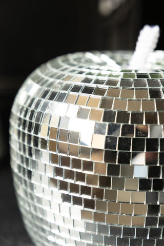 The side of the Silver Disco Ball Apple Decoration, showing the mirror tiles. 