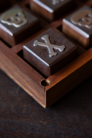Detail image of the Skull & Bones Tic Tac Toe Board Game