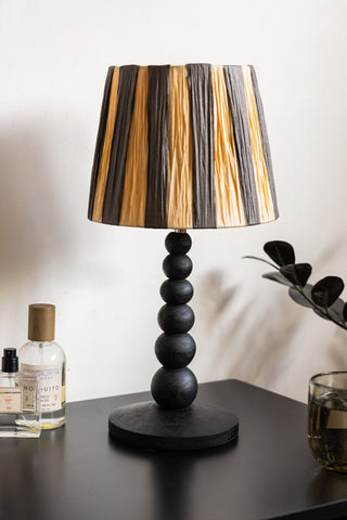 Image of the Small Black Bobbin Bedside Table Lamp on a bedside table