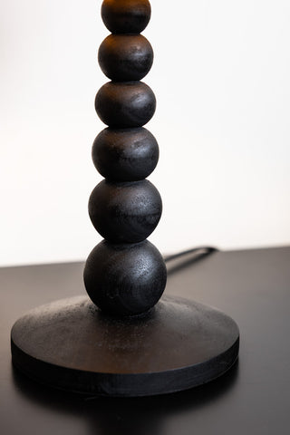 Detail image of the base for the Small Black Bobbin Bedside Table Lamp