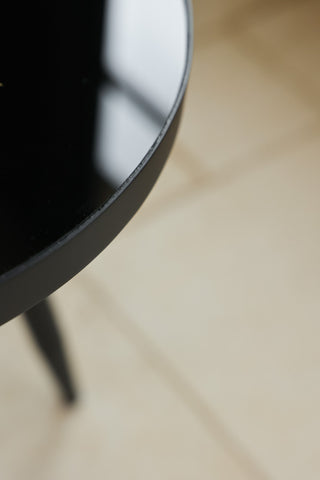 Detail image of the Small Black Star Side Table. 