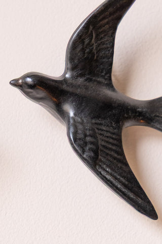 Close-up image of the Small Black Swallow Wall Decoration