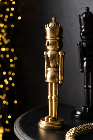 Lifestyle image of the Small Gold Christmas Nutcracker Decoration