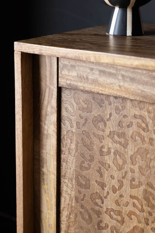 Detail of the corner of the Natural Leopard Print Small Sideboard.