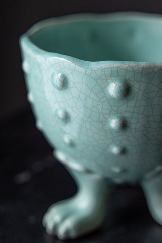 Close-up image of the Small Mint Green Footed Planter