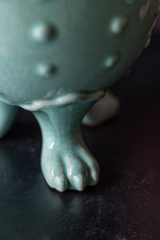 Image of the foot on the Small Mint Green Footed Planter