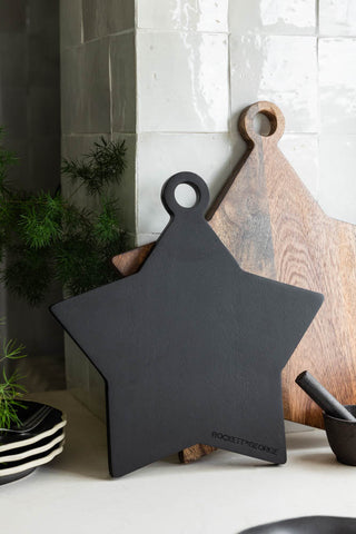 Lifestyle image of the Small Black Star Serving Board