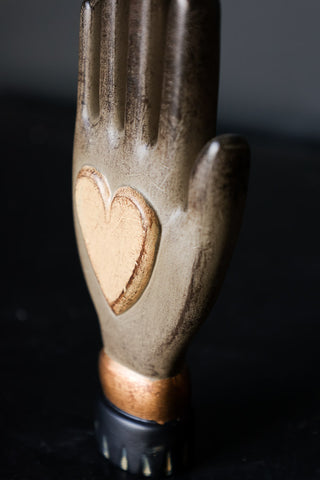 Close-up image of the Small Off-White Heart On Hand Wall Ornament