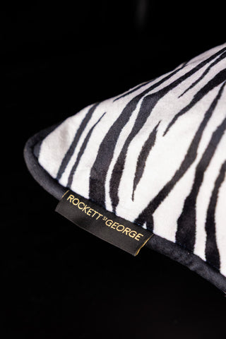Image of the label on the Snow Tiger Print Cushion