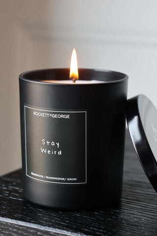 Lifestyle image of the Rockett St George Stay Weird Cedarwood & Frankincense Candle