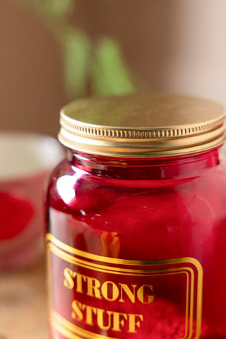 Image of the Strong Stuff Hot Pink Glass Storage Jar