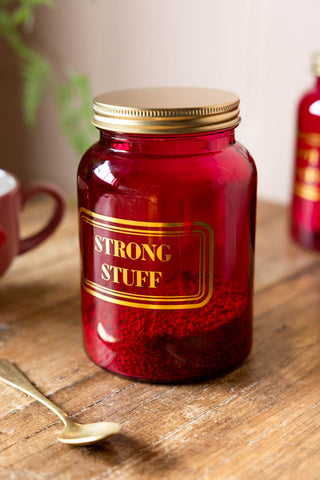 Detail image of the Strong Stuff Hot Pink Glass Storage Jar