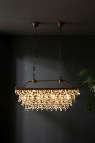 Chandelier with crystal accents on a dark background