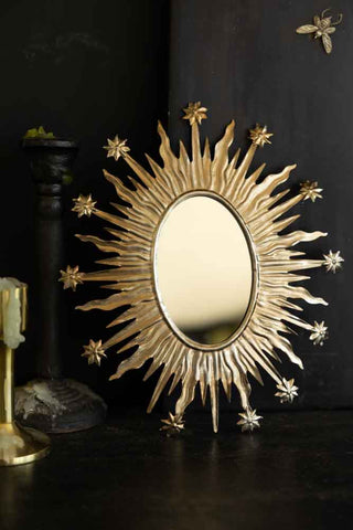 Lifestyle image of the Antique Silver Sunburst & Stars Mirror