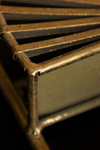 Detail image of the Sunrise Decorative Wall Shelf in Antique Brass