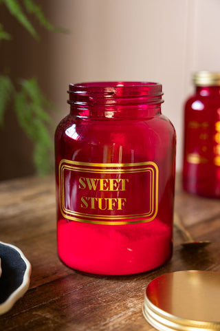 Lifestyle image of the Sweet Stuff Hot Pink Glass Storage Jar