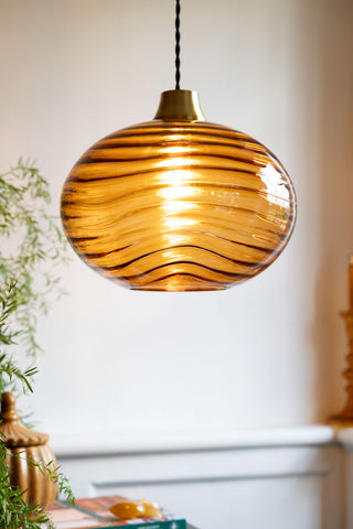 Lifestyle image of the Swirled Glass Easyfit Ceiling Light Shade in Amber