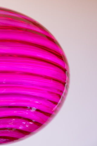 Close-up image of the Swirled Glass Easyfit Ceiling Light Shade in Pink