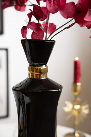 Close-up image of the Tall Black Perfume Bottle Vase