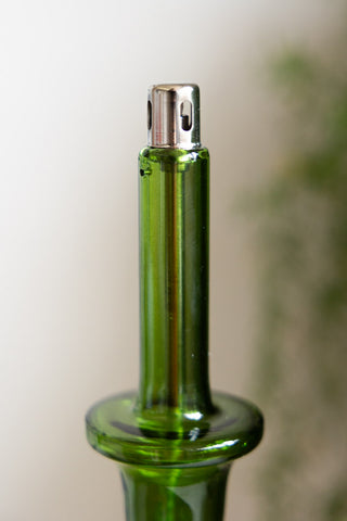 Detail image of the Tall Green Glass Refillable Candle Holder