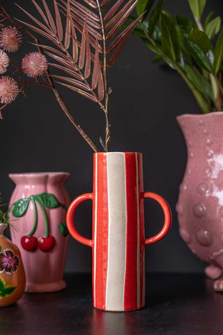 Lifestyle image of the Tall Red Stripe Vase With Handles