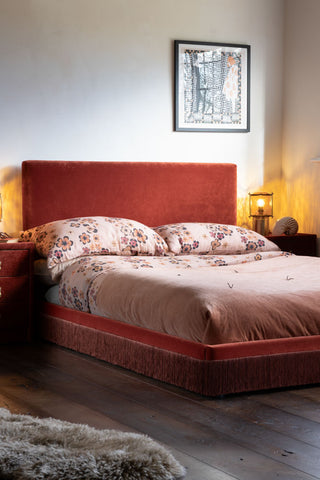 Lifestyle image of the Tassel Bed in Sienna Orange Luxe Needlecord Velvet - Available in 3 Sizes