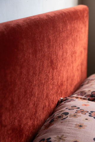 Image of the headboard on the Tassel Bed in Sienna Orange Luxe Needlecord Velvet - Available in 3 Sizes