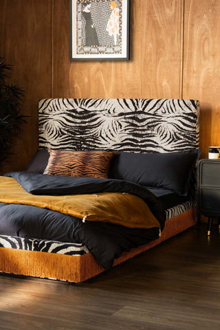 Lifestyle image of the Tassel Bed in Zebra Print Needlecord Velvet - Available in 2 Sizes