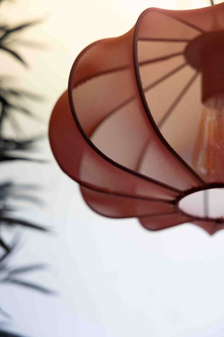 Close-up image of the Terracotta Mesh Pendant Light