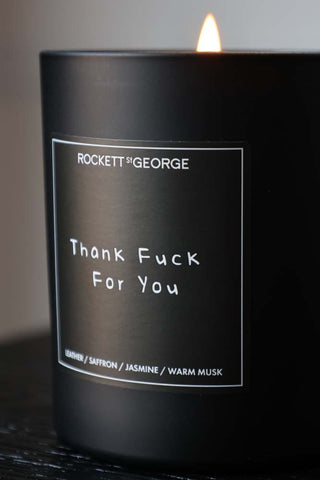 Lifestyle image of the Rockett St George Thank Fuck For You Leather & Saffron Candle