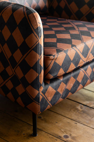 Detail image of the The Edie Caramel Checkerboard Velvet Armchair