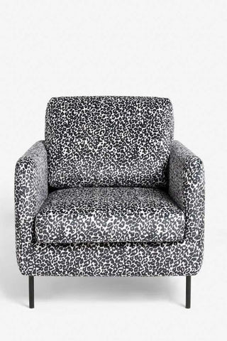 Image of the The Edie Monochrome Leopard Velvet Armchair on a white background