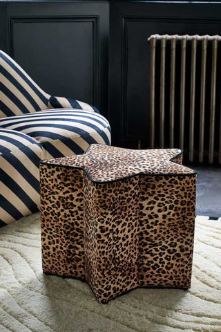Lifestyle image of the The Leopard Print Velvet Star Footstool