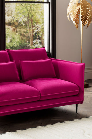 Close-up of one side of The Lola 2 Seater Sofa in Harry's Pink Velvet.