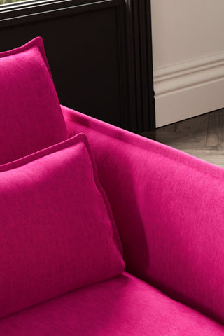 Close-up of the back/cushions of The Lola Snuggle Seat in Harry's Pink Velvet.