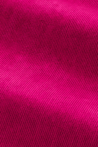 Close-up of the fabric of The Lola Snuggle Seat in Harry's Pink Velvet.
