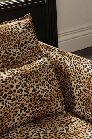 Close-up of the back/cushions of The Lola 2 Seater Sofa in Leopard Print Velvet.