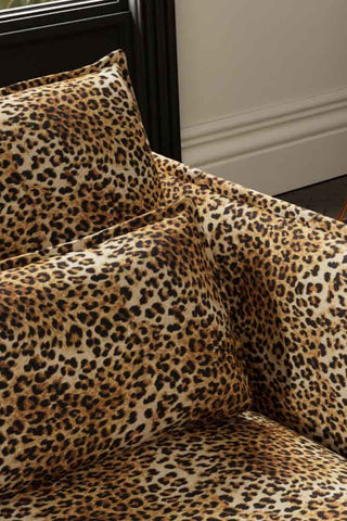 Close-up of the back/cushions of The Lola 3 Seater Sofa in Leopard Print Velvet.