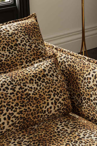 Close-up of the back/cushions of The Lola 4 Seater Sofa in Leopard Print Velvet.