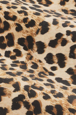Close-up of the fabric of The Lola 4 Seater Sofa in Leopard Print Velvet.