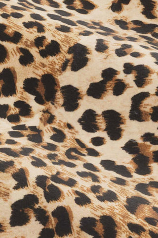 Close-up of the  fabric of The Lola Footstool in Leopard Print Velvet.