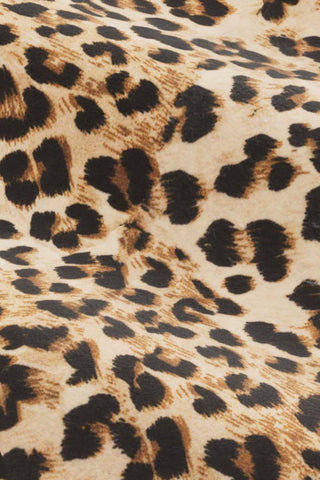Close-up of the fabric of The Lola Snuggle Seat in Leopard Print Velvet.