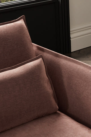 Close-up of The Lola Snuggle Seat in Luxe Pink Velvet.