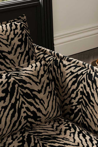 Close-up of the back/cushion of The Lola 2 Seater Sofa in Tiger Print Velvet.