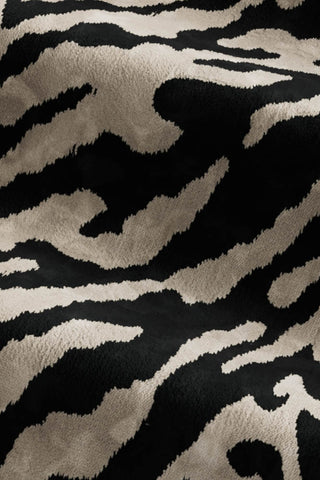 Close-up of the fabric of The Lola 3 Seater Sofa in Tiger Print Velvet.